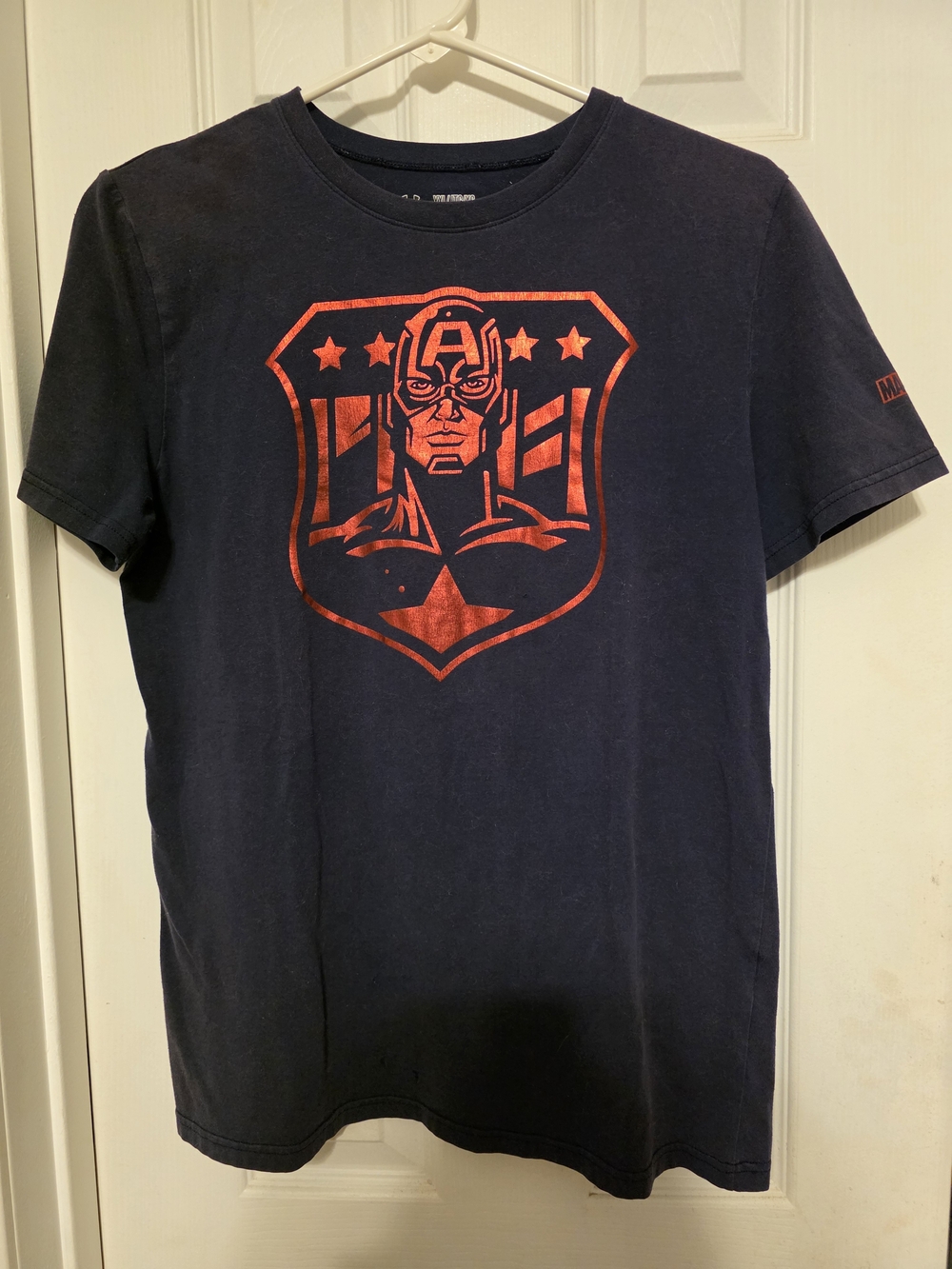Under Armour Navy Tee with Metallic Red Shield Graphic